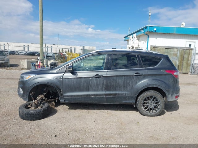 12595080 :رقم المزاد ، 1FMCU9J95HUA06413 vin ، 2017 Ford Escape Titanium مزاد بيع