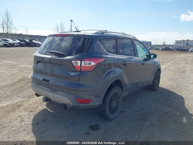 12595080 :رقم المزاد ، 1FMCU9J95HUA06413 vin ، 2017 Ford Escape Titanium مزاد بيع