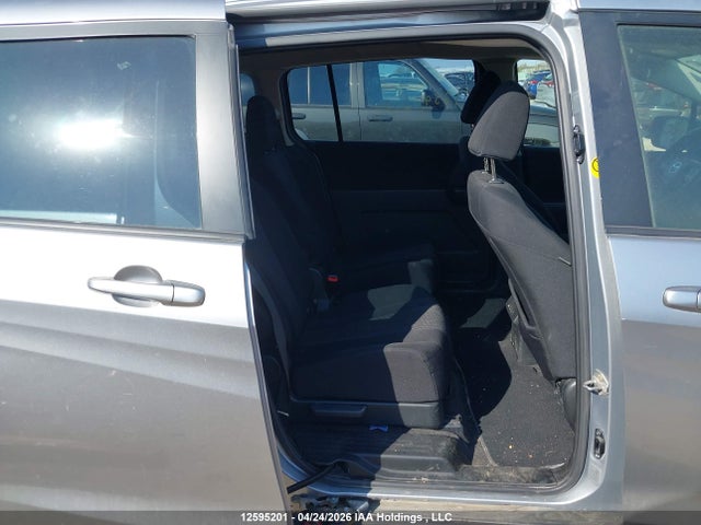 12595201 :رقم المزاد ، JM1CW2CLXC0128702 vin ، 2012 Mazda Mazda5 Gs مزاد بيع