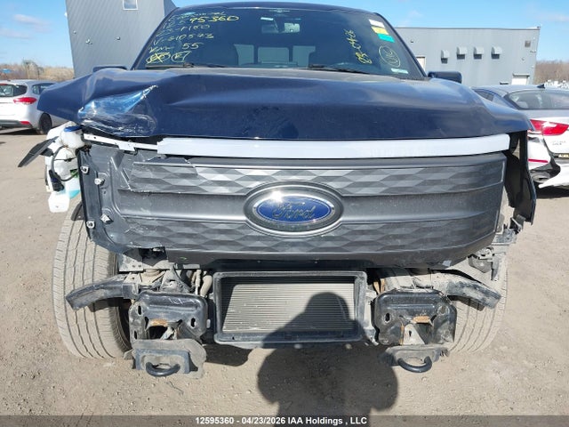 12595360 :رقم المزاد ، 1FT6W1EV2PWG10573 vin ، 2023 Ford F-150 Lightning Lariat مزاد بيع