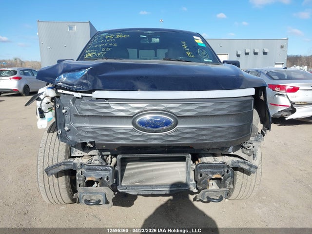 12595360 :رقم المزاد ، 1FT6W1EV2PWG10573 vin ، 2023 Ford F-150 Lightning Lariat مزاد بيع