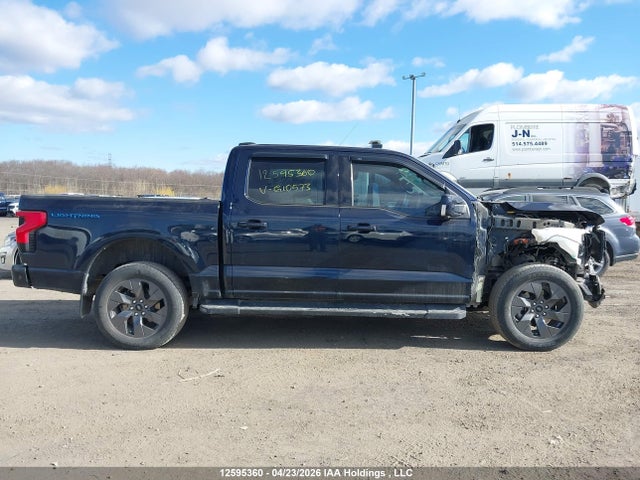 12595360 :رقم المزاد ، 1FT6W1EV2PWG10573 vin ، 2023 Ford F-150 Lightning Lariat مزاد بيع