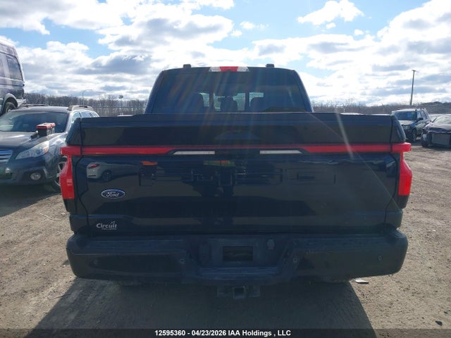 12595360 :رقم المزاد ، 1FT6W1EV2PWG10573 vin ، 2023 Ford F-150 Lightning Lariat مزاد بيع