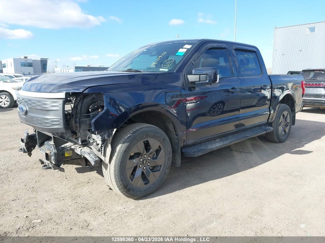 12595360 :رقم المزاد ، 1FT6W1EV2PWG10573 vin ، 2023 Ford F-150 Lightning Lariat مزاد بيع