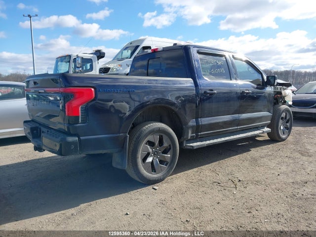 12595360 :رقم المزاد ، 1FT6W1EV2PWG10573 vin ، 2023 Ford F-150 Lightning Lariat مزاد بيع
