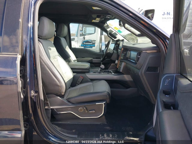 12595360 :رقم المزاد ، 1FT6W1EV2PWG10573 vin ، 2023 Ford F-150 Lightning Lariat مزاد بيع
