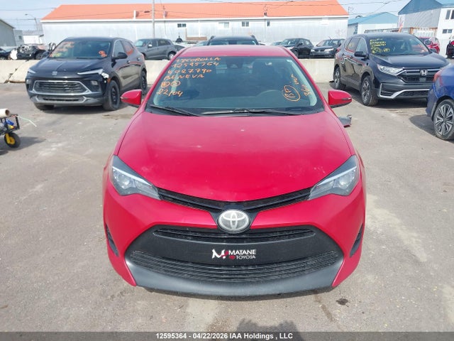 12595364 :رقم المزاد ، 2T1BURHE0JC027790 vin ، 2018 Toyota Corolla Le مزاد بيع