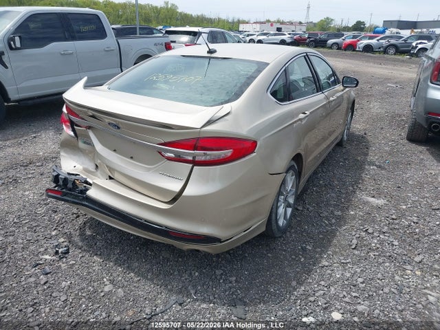 2017 Ford Fusion Energi Titanium მანქანა იყიდება აუქციონზე, vin: 3FA6P0SUXHR169157, აუქციონის ნომერი: 12595707