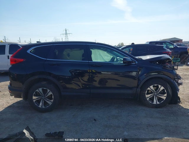 12595744 :رقم المزاد ، 2HKRW2H22KH132867 vin ، 2019 Honda Cr-v Lx مزاد بيع