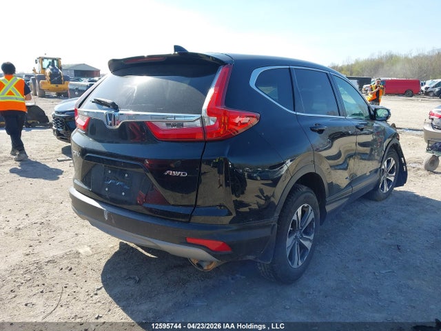 12595744 :رقم المزاد ، 2HKRW2H22KH132867 vin ، 2019 Honda Cr-v Lx مزاد بيع
