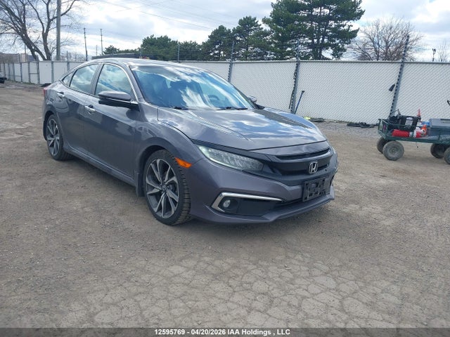 12595769 :رقم المزاد ، 2HGFC1F9XLH101254 vin ، 2020 Honda Civic Touring مزاد بيع
