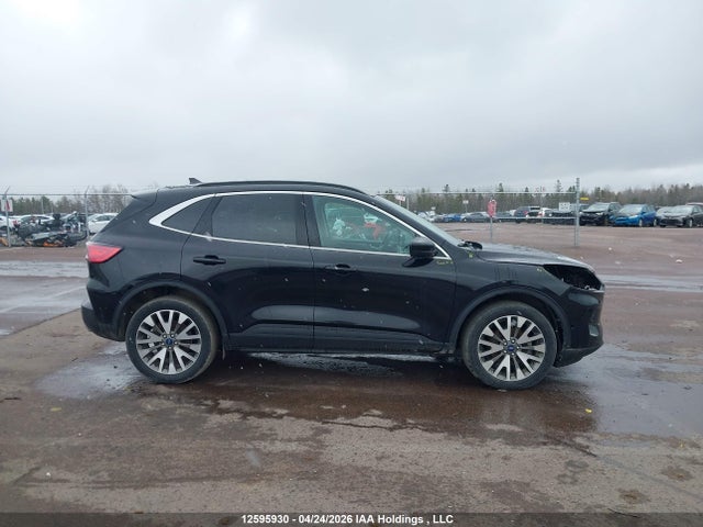 12595930 :رقم المزاد ، 1FMCU9DZ2MUA56787 vin ، 2021 Ford Escape Titanium Hybrid مزاد بيع