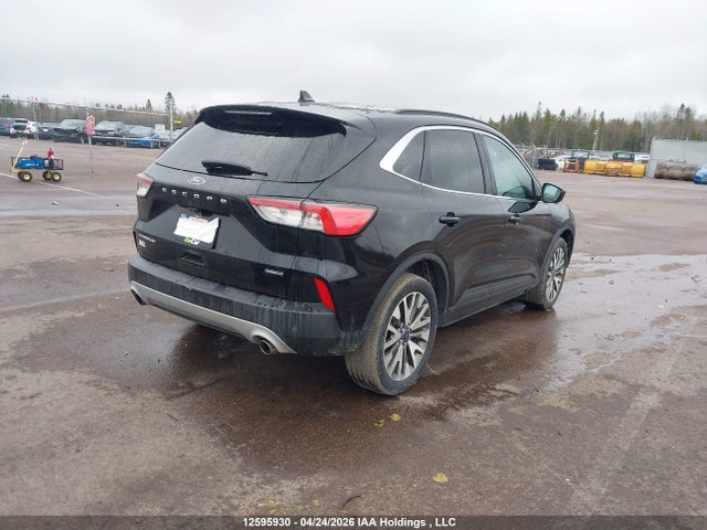12595930 :رقم المزاد ، 1FMCU9DZ2MUA56787 vin ، 2021 Ford Escape Titanium Hybrid مزاد بيع