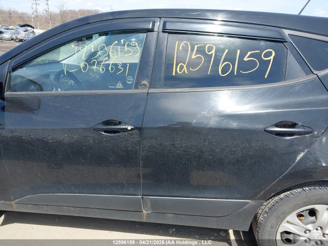 KM8JTCAFXFU076631 Hyundai TUCSON GLS