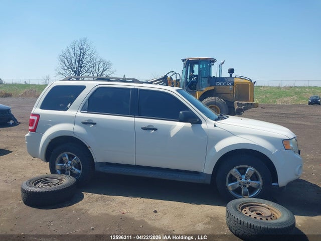 12596311 :رقم المزاد ، 1FMCU0DG9BKA64047 vin ، 2011 Ford Escape مزاد بيع