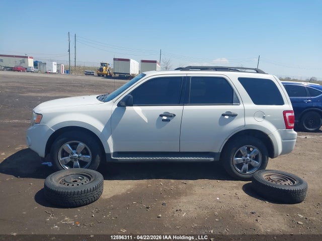 12596311 :رقم المزاد ، 1FMCU0DG9BKA64047 vin ، 2011 Ford Escape مزاد بيع