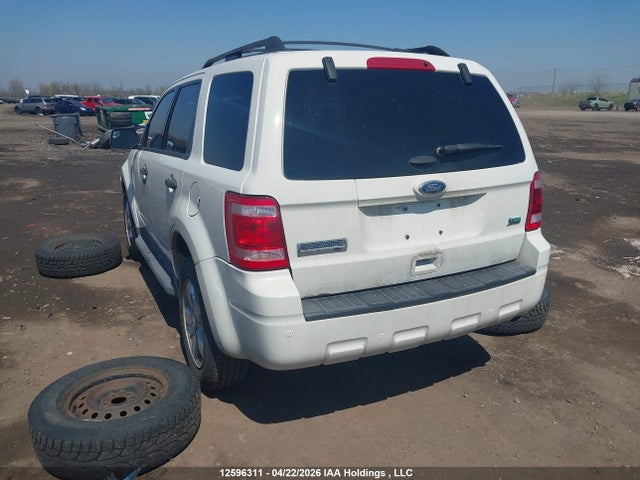 12596311 :رقم المزاد ، 1FMCU0DG9BKA64047 vin ، 2011 Ford Escape مزاد بيع