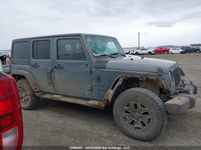1C4BJWDG9EL144815 Jeep Wrangler Unlimited Sport