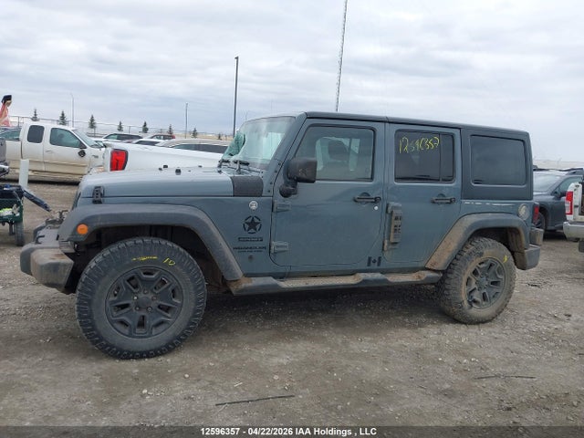 1C4BJWDG9EL144815 Jeep Wrangler Unlimited Sport