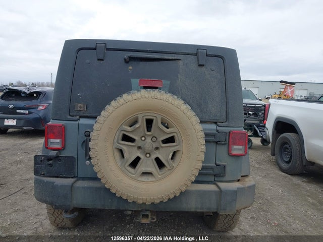 1C4BJWDG9EL144815 Jeep Wrangler Unlimited Sport