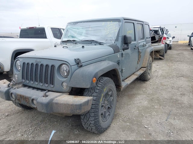 1C4BJWDG9EL144815 Jeep Wrangler Unlimited Sport