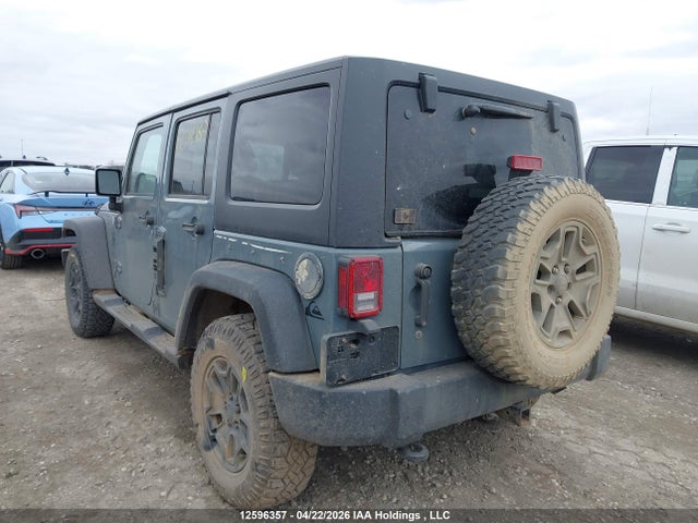 1C4BJWDG9EL144815 Jeep Wrangler Unlimited Sport