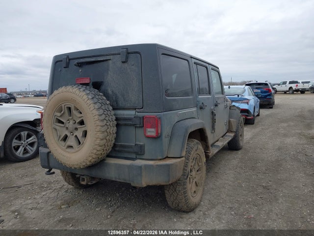 1C4BJWDG9EL144815 Jeep Wrangler Unlimited Sport