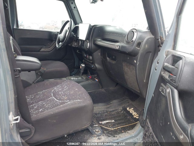 1C4BJWDG9EL144815 Jeep Wrangler Unlimited Sport