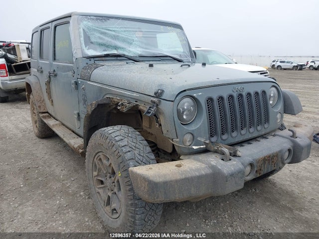 1C4BJWDG9EL144815 Jeep Wrangler Unlimited Sport