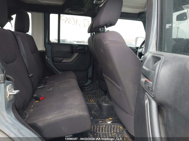 1C4BJWDG9EL144815 Jeep Wrangler Unlimited Sport