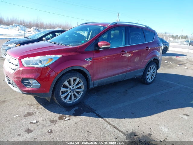 Продажа на аукционе авто 2017 Ford Escape Titanium, vin: 1FMCU9J90HUD88396, номер лота: 12556721
