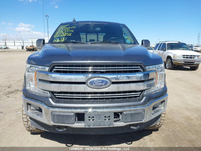 1FTEW1E4XKFA69476 Ford F150 Supercrew