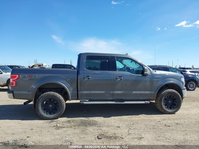 1FTEW1E4XKFA69476 Ford F150 Supercrew