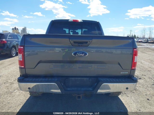 1FTEW1E4XKFA69476 Ford F150 Supercrew