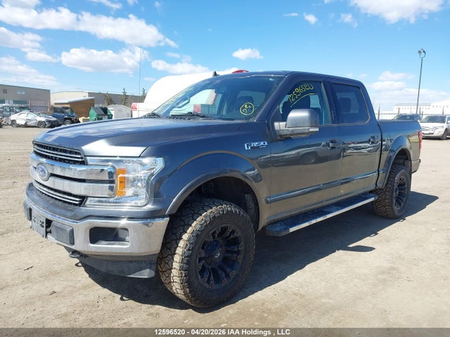 1FTEW1E4XKFA69476 Ford F150 Supercrew