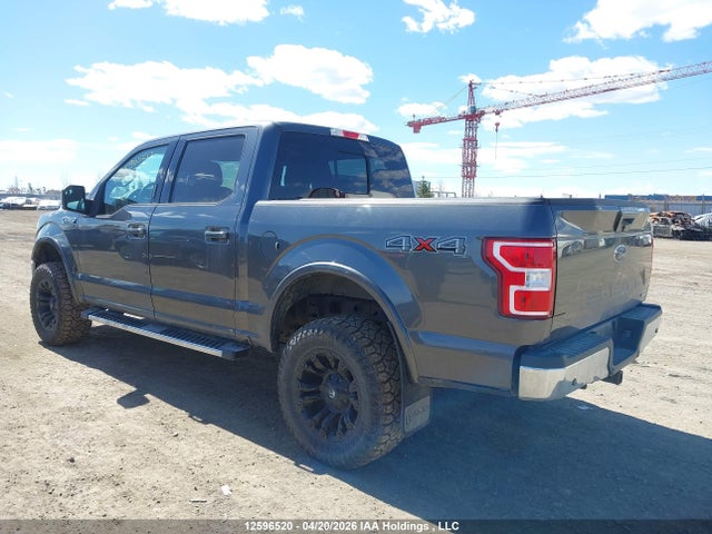 1FTEW1E4XKFA69476 Ford F150 Supercrew