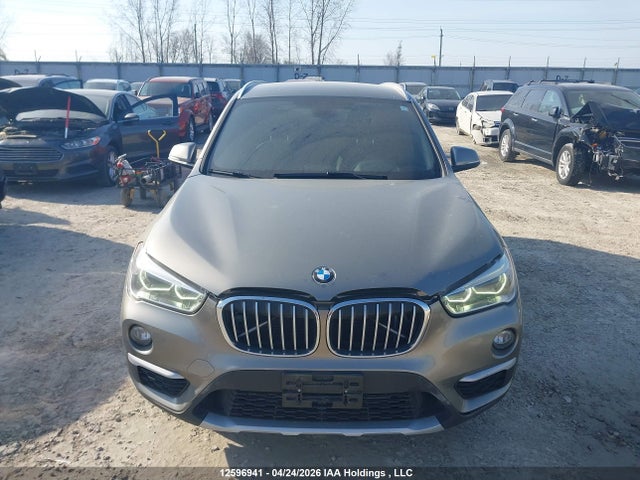 12596941 :رقم المزاد ، WBXHT3C38G5E52640 vin ، 2016 Bmw X1 Xdrive28i مزاد بيع