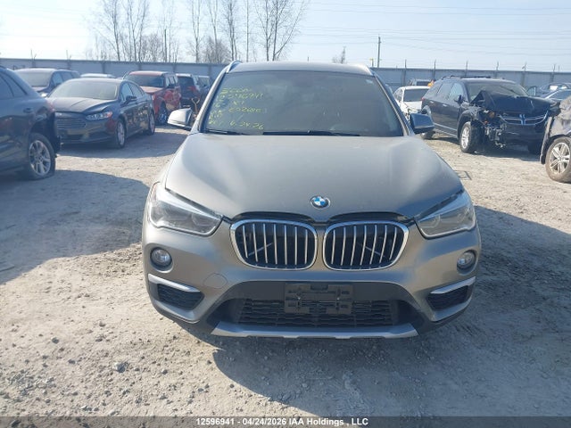12596941 :رقم المزاد ، WBXHT3C38G5E52640 vin ، 2016 Bmw X1 Xdrive28i مزاد بيع