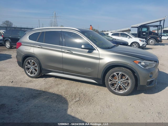 12596941 :رقم المزاد ، WBXHT3C38G5E52640 vin ، 2016 Bmw X1 Xdrive28i مزاد بيع