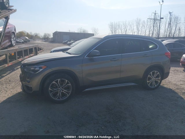 12596941 :رقم المزاد ، WBXHT3C38G5E52640 vin ، 2016 Bmw X1 Xdrive28i مزاد بيع