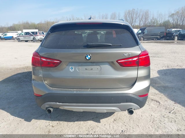 12596941 :رقم المزاد ، WBXHT3C38G5E52640 vin ، 2016 Bmw X1 Xdrive28i مزاد بيع