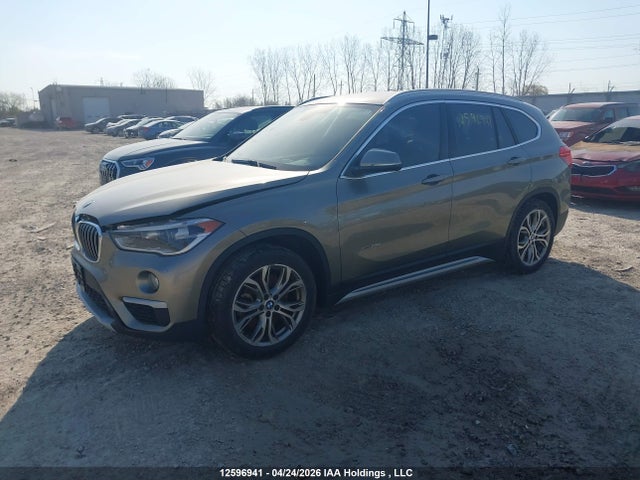 12596941 :رقم المزاد ، WBXHT3C38G5E52640 vin ، 2016 Bmw X1 Xdrive28i مزاد بيع