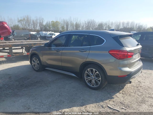 12596941 :رقم المزاد ، WBXHT3C38G5E52640 vin ، 2016 Bmw X1 Xdrive28i مزاد بيع