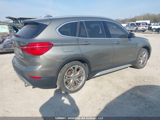 12596941 :رقم المزاد ، WBXHT3C38G5E52640 vin ، 2016 Bmw X1 Xdrive28i مزاد بيع