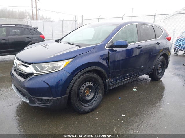 12597174 :رقم المزاد ، 2HKRW2H23HH135012 vin ، 2017 Honda Cr-v Lx مزاد بيع