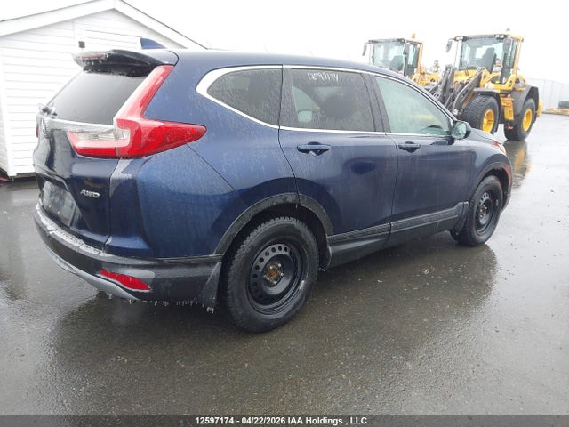 12597174 :رقم المزاد ، 2HKRW2H23HH135012 vin ، 2017 Honda Cr-v Lx مزاد بيع