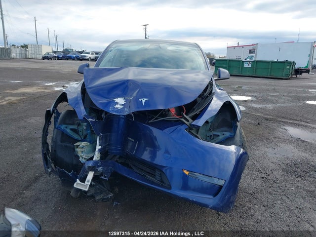 12597315 :رقم المزاد ، LRWYGDFD5PC966785 vin ، 2023 Tesla Model Y Rwd مزاد بيع