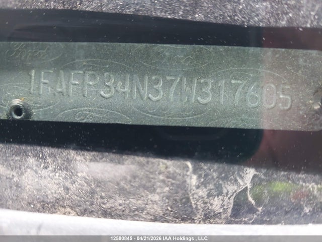 12580845 :رقم المزاد ، 1FAFP34N37W317605 vin ، 2007 Ford Focus S/se/ses مزاد بيع