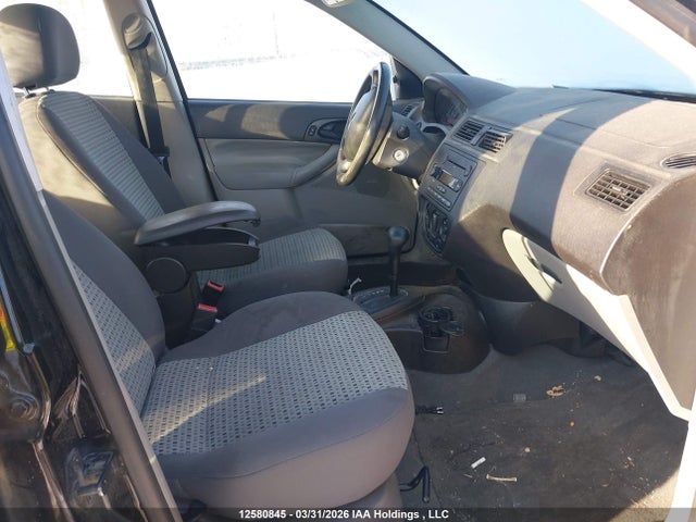 12580845 :رقم المزاد ، 1FAFP34N37W317605 vin ، 2007 Ford Focus S/se/ses مزاد بيع
