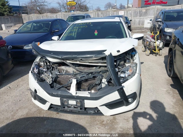 2HGFC1F42JH100410 Honda Civic